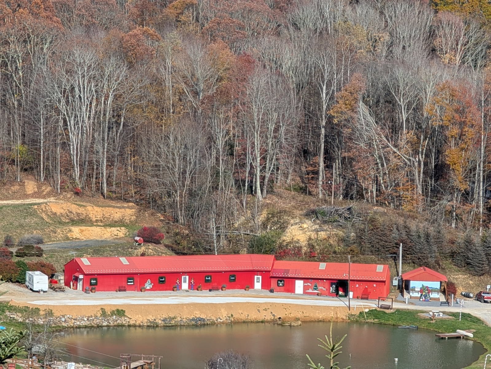 The Sugar Plum Farms red barn and pond
